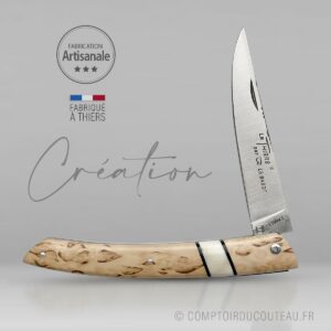 couteau de collection le Thiers® - bouleau de Finlande et Phacochère - lame et ressort guillochés