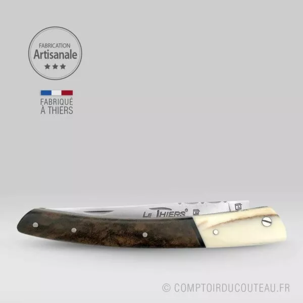couteau le thiers bi-matières manche en noyer et dent phacochère, lame et ressort guilloches