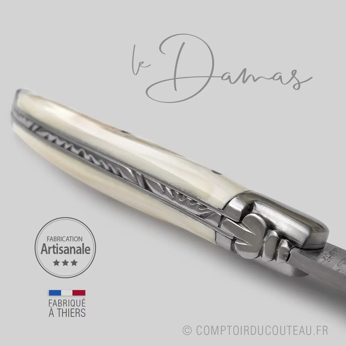 couteau laguiole lame damas ivoire de phacochère pour amateur de couteaux d'exception