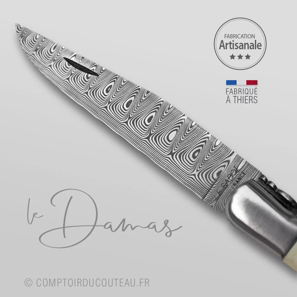 couteau laguiole lame damas forge main manche ivoire phacochère