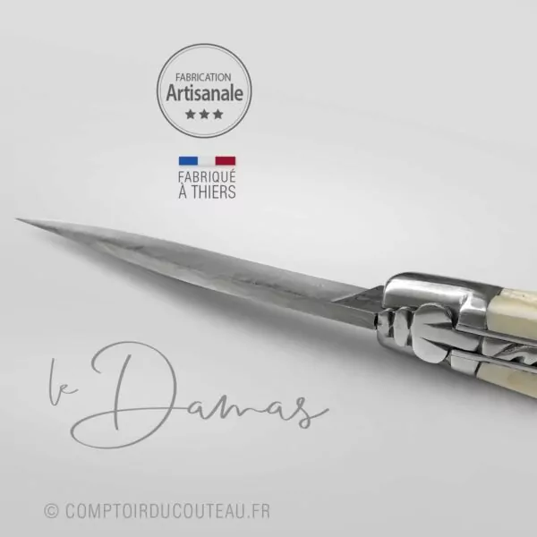 couteau laguiole lame damas dent de phacochère detail