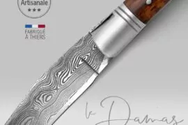 Détail de la lame damas du couteau Laguiole à manche en bois d’amourette