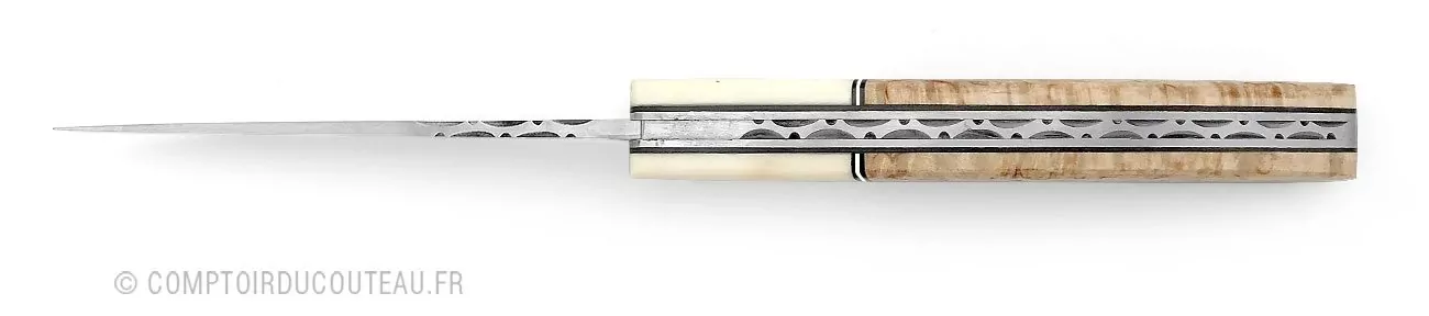 couteau le thiers manche en bouleau finlandais et dent phacochère, lame et ressort guilloches vue profil