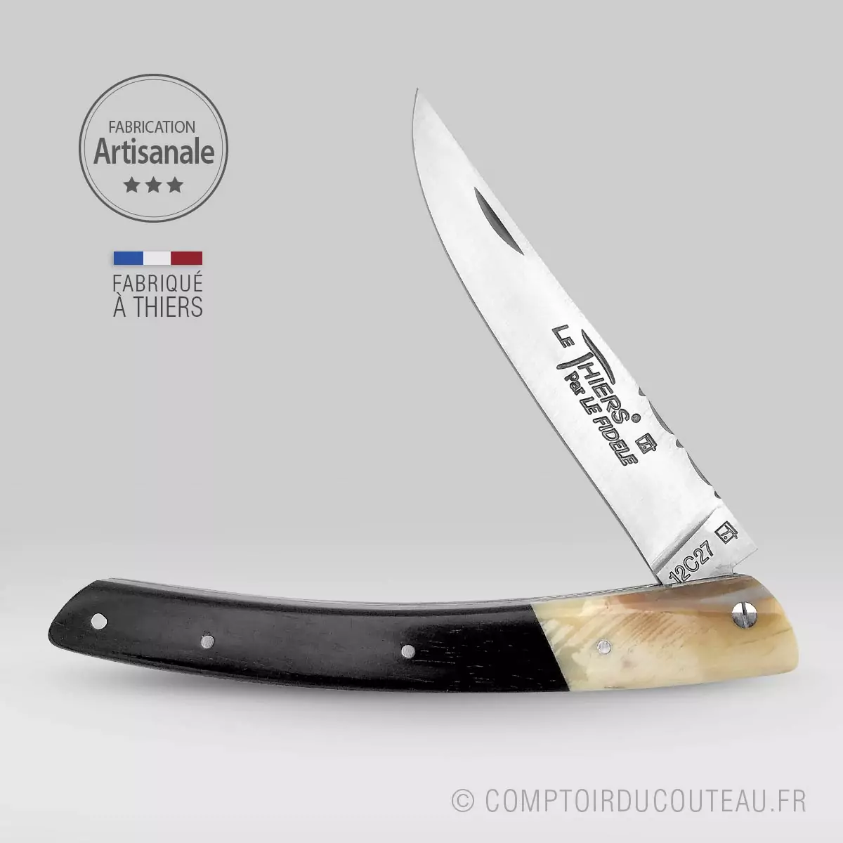 couteau le thiers bi-matières manche en ébène et dent phacochère, lame et ressort guilloches