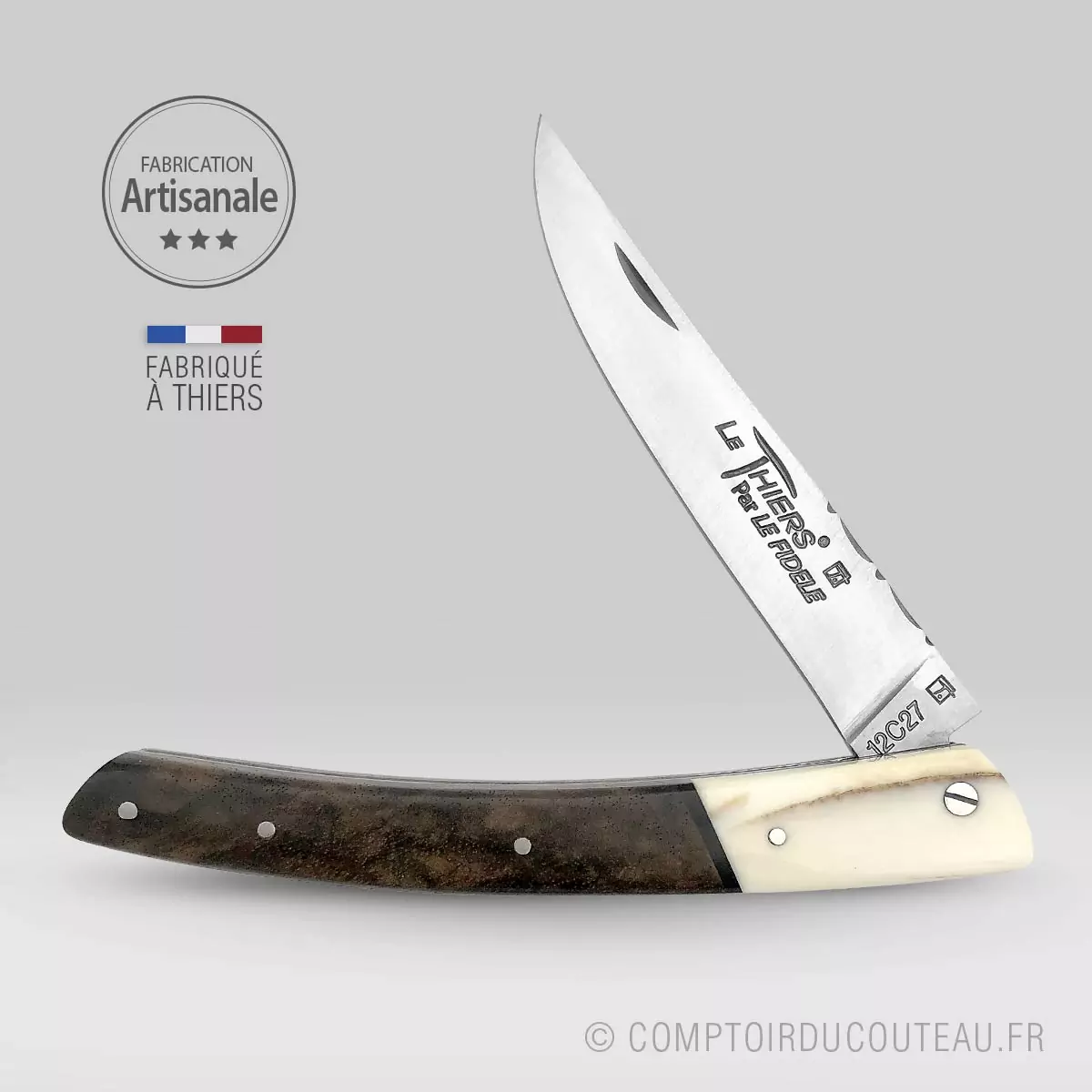couteau le thiers bi-matières manche en noyer et dent phacochère, lame et ressort guilloches