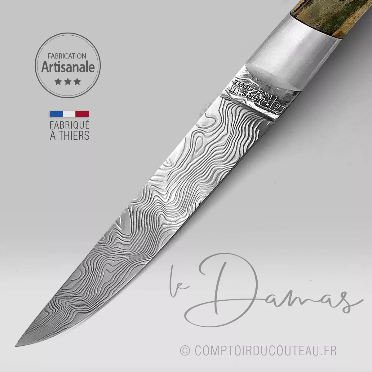 couteau le Thiers lame damas manche croûte de mammouth ressort guilloche détail lame damas inox