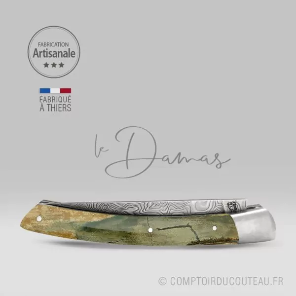 couteau le Thiers lame damas manche croûte de mammouth ressort guilloche fermé