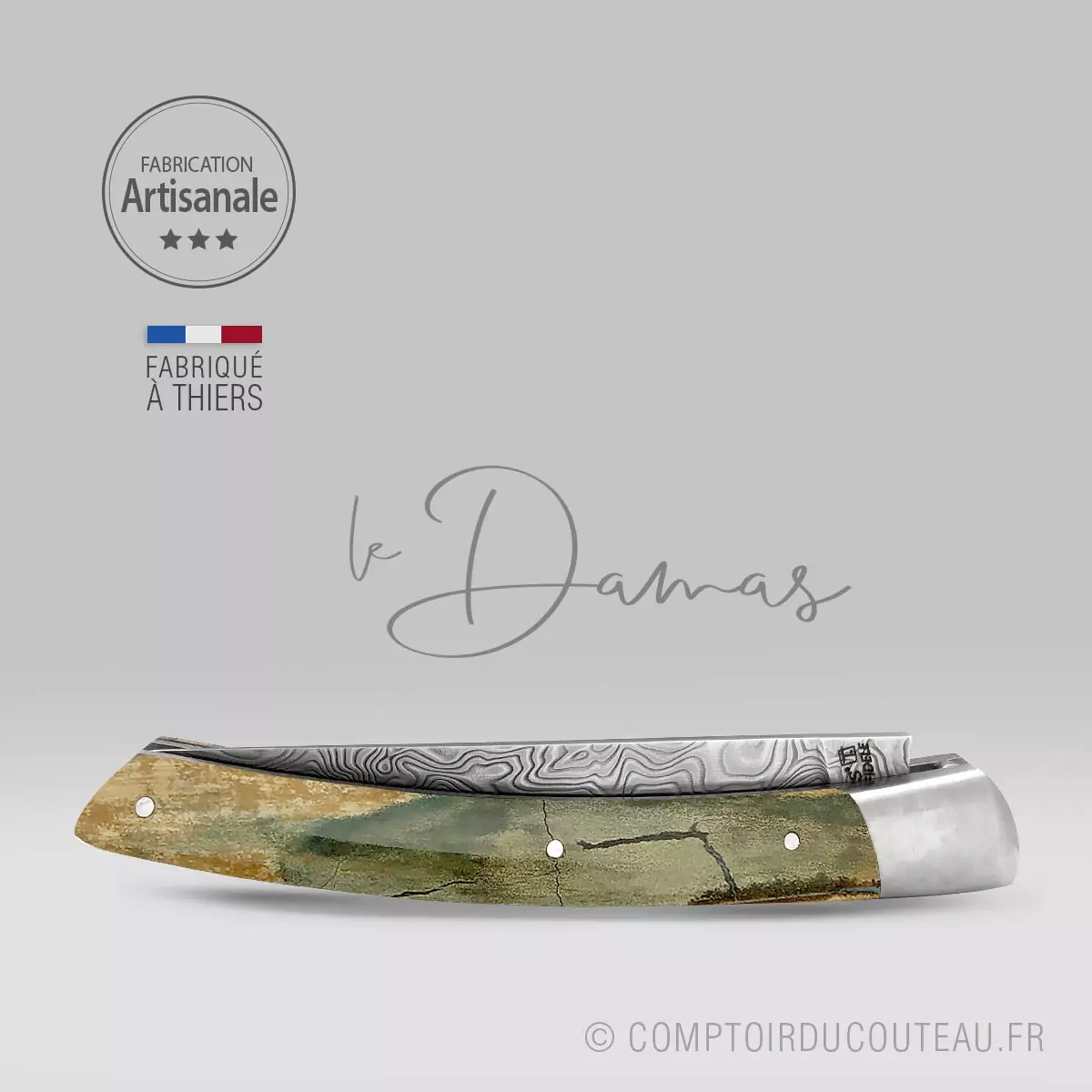 couteau le Thiers lame damas manche croûte de mammouth ressort guilloche fermé